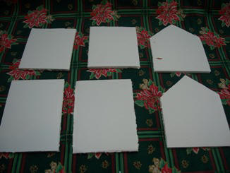 Cut foam core board to make a gingerbread house